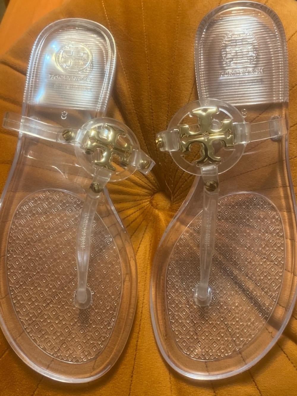 Tory Burch Clear Jelly Thong Sandals with Gold Logo Medallions